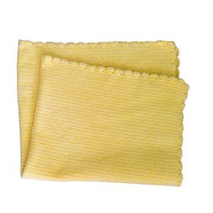 Yellow hand-knit granny blanket